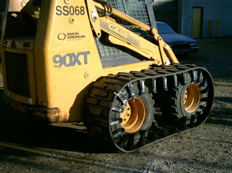 rubber track over tire skid steer|bobcat 753 over tire tracks.